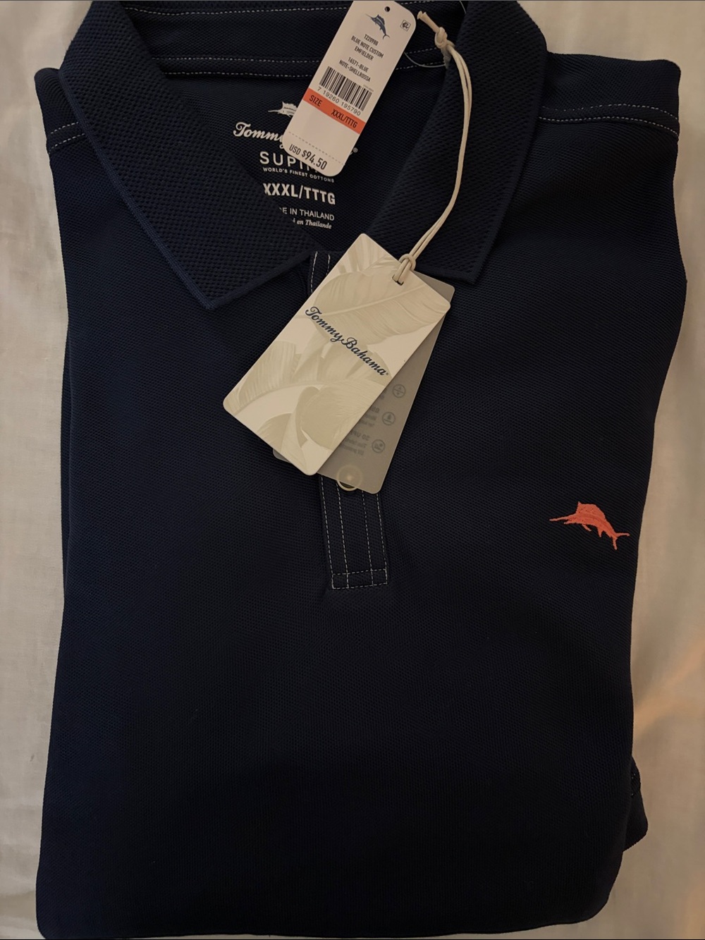 Tommy Bahama Navy Polo with Coral Marlin Embroidery